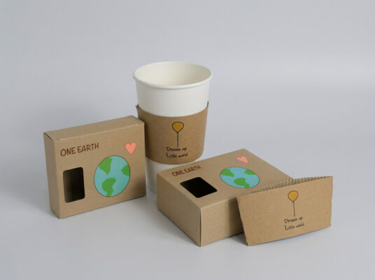 Custom eco-friendly kraft paper boxes and a corrugated coffee sleeve with "One Earth" branding, printed with soy-based ink by DY Printing Box in Markham.