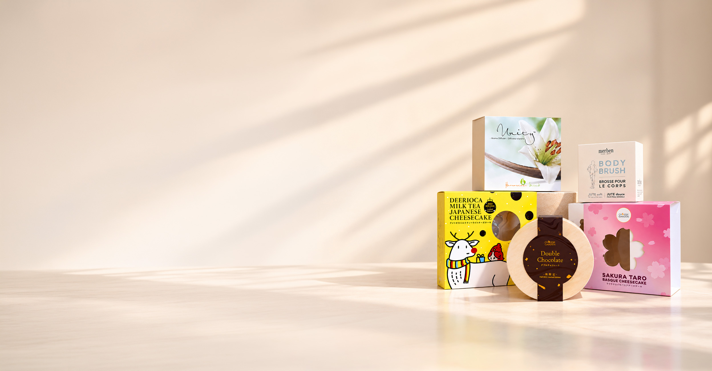 Custom printed packaging sleeves and belly bands displayed on a warm beige background